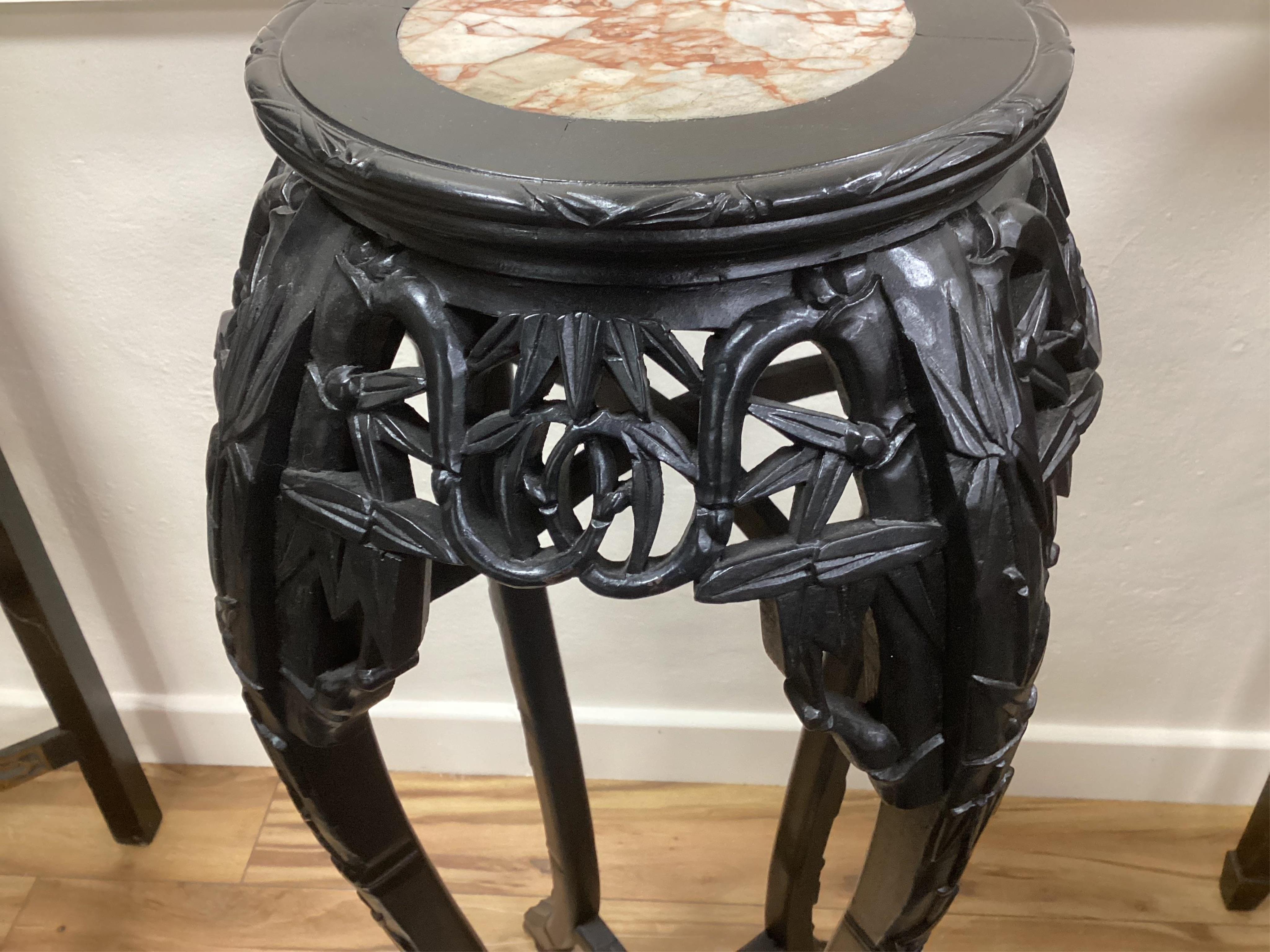 A Chinese marble topped vase stand, diameter 34cm, height 90cm